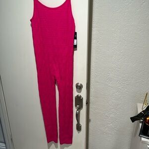 Hot pink jumpsuit.